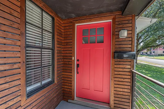 a view of a door and a window