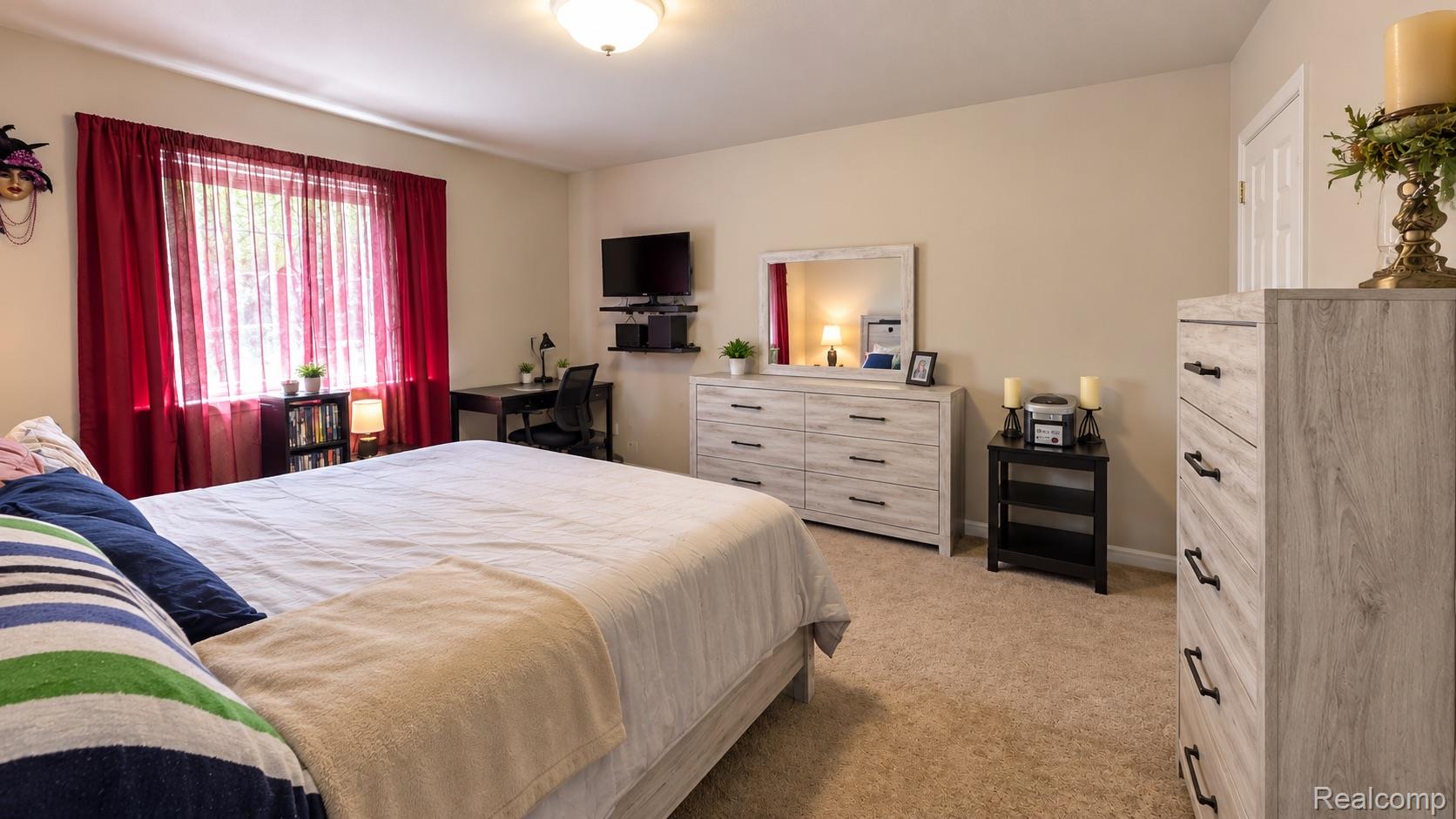 15818 East 14 Mile Road Fraser, MI 48026 - Photo 12 of 26 Wall-to-wall carpeting and neutral wall tones