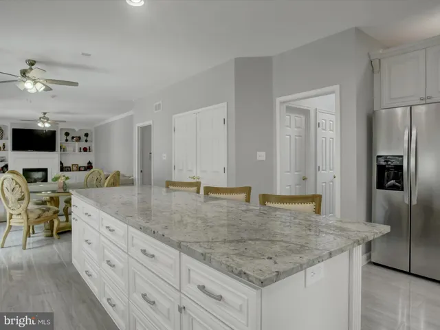 a view of balcony with outdoor seating and wooden floor