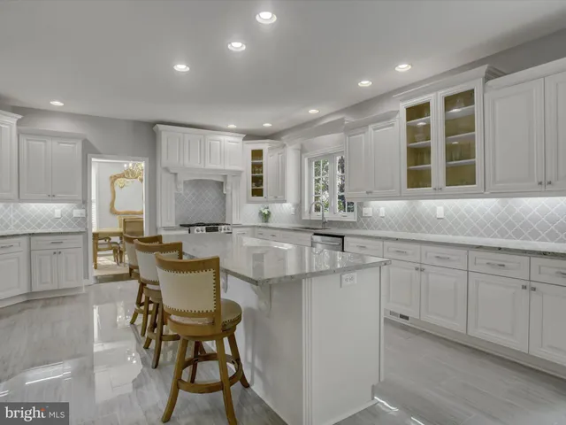 a bedroom with a bed and a lamp