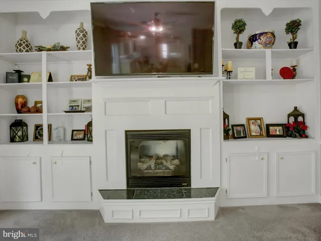 a spacious bathroom with a double vanity sink a large mirror and a bathtub