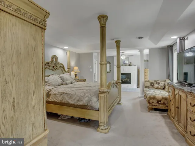 a bathroom with a sink a mirror and vanity