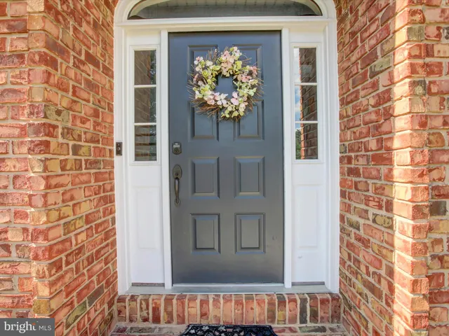 a view of living room with furniture and window