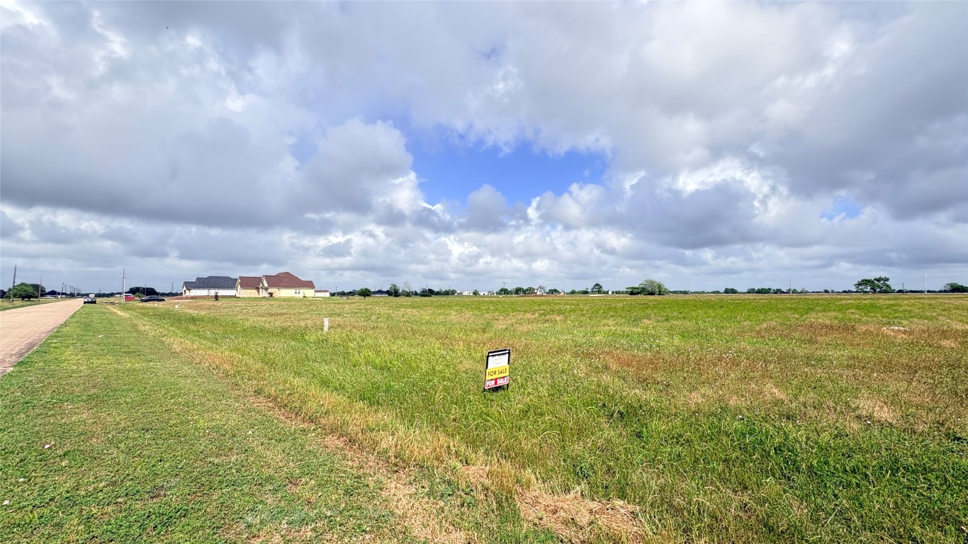 383 Brahman Trail Angleton, TX 77515 - Photo 2 of 7 a view of an outdoor space and yard
