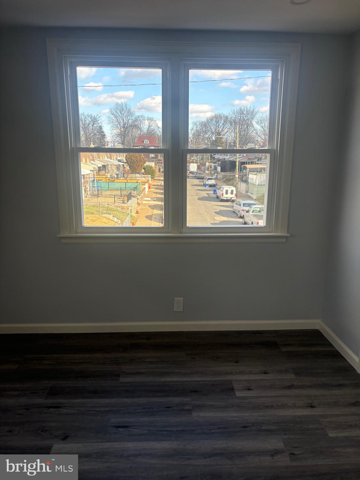 1870 Pratt Street Philadelphia, PA 19124 - Photo 11 of 23 a view of an empty room with wooden floor and a window