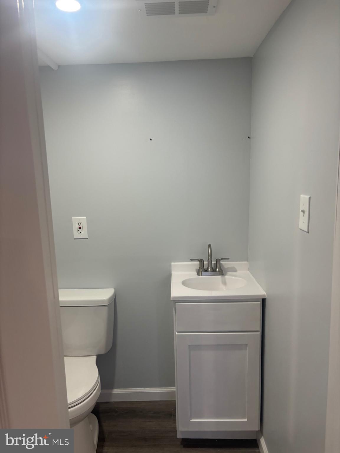 1870 Pratt Street Philadelphia, PA 19124 - Photo 17 of 23 a bathroom with a sink toilet and a mirror