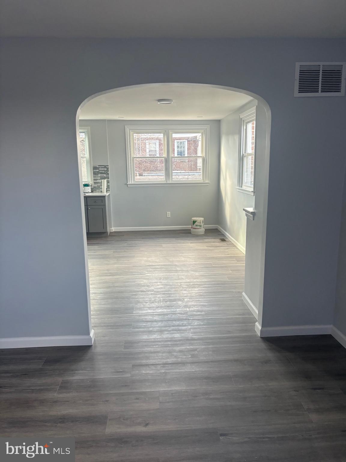 1870 Pratt Street Philadelphia, PA 19124 - Photo 21 of 23 a view of wooden floor and windows in a room