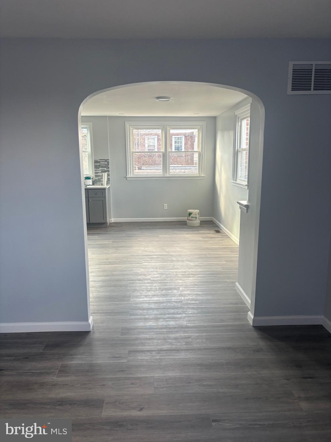 1870 Pratt Street Philadelphia, PA 19124 - Photo 22 of 23 a view of wooden floor and windows in a room