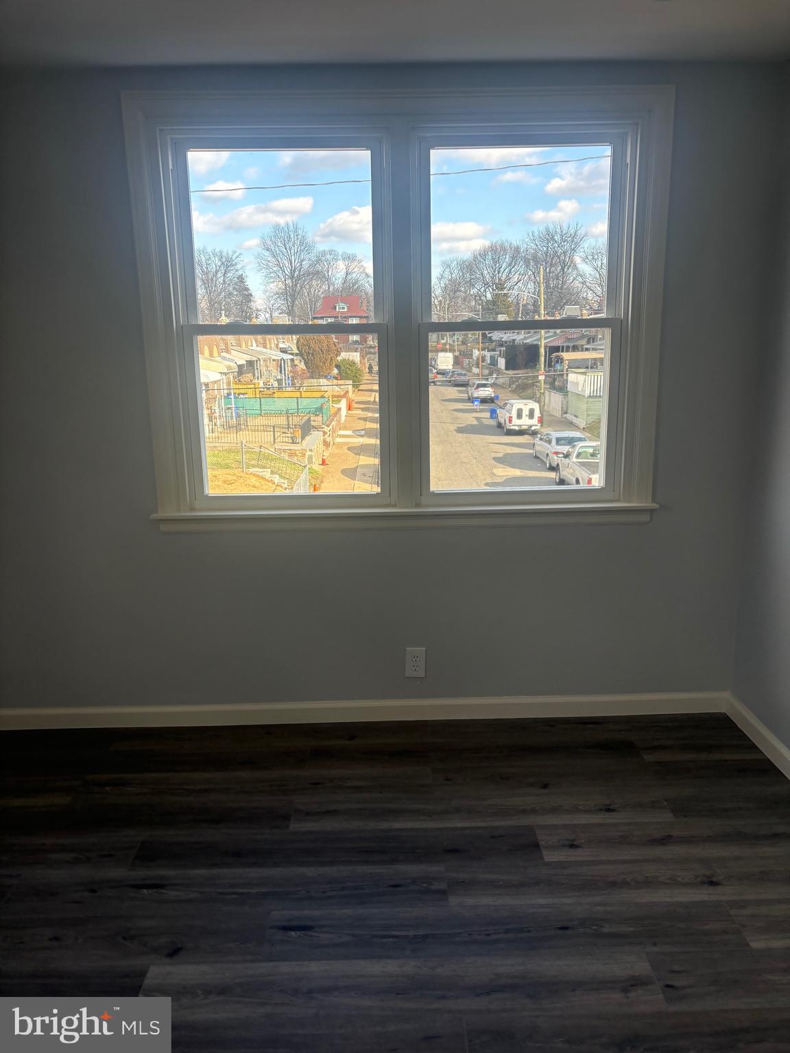 1870 Pratt Street Philadelphia, PA 19124 - Photo 10 of 23 a view of an empty room with wooden floor and a window
