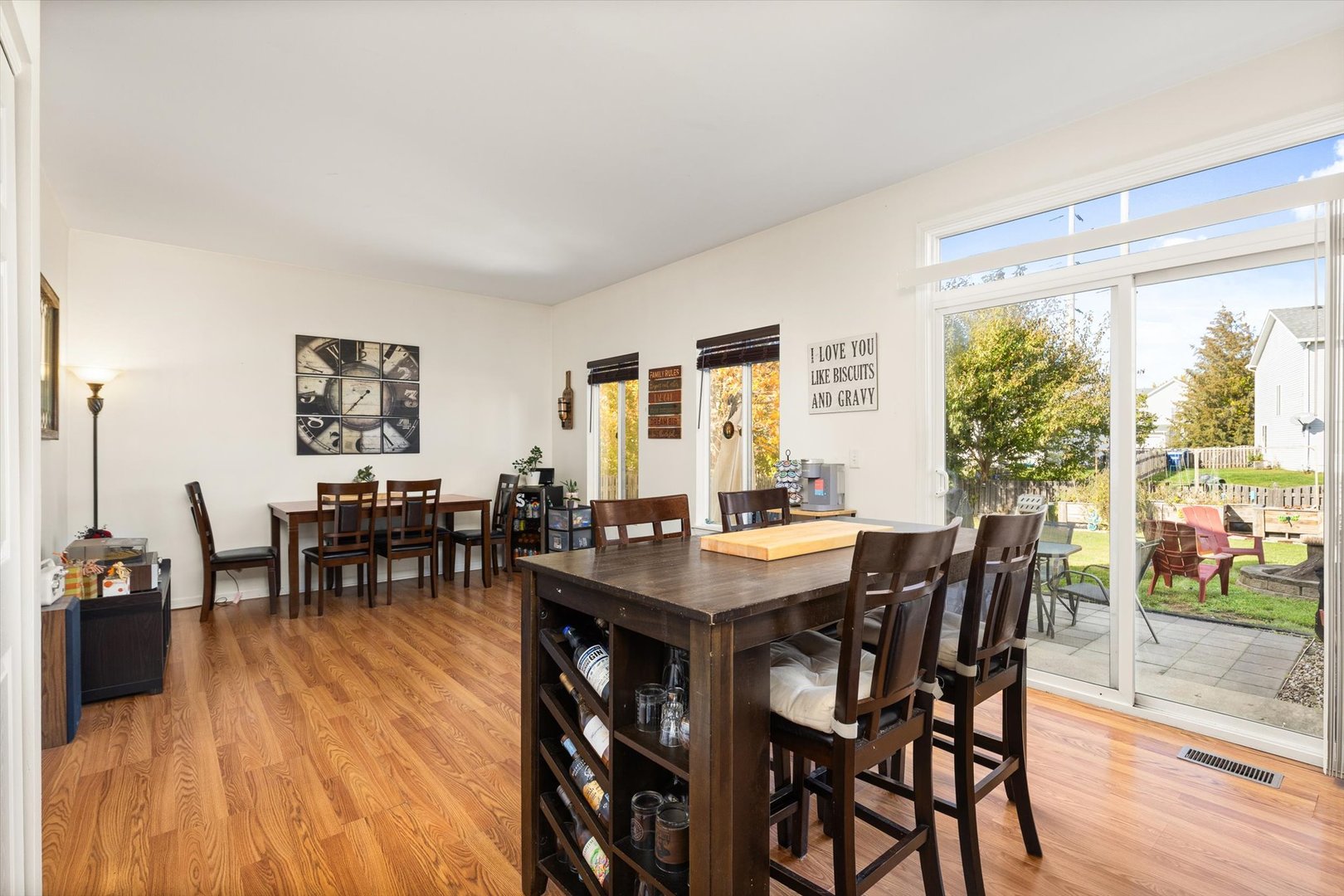 2267 Margaret Drive Montgomery, IL 60538 - Photo 12 of 35 a view of a dining room with furniture and wooden floor