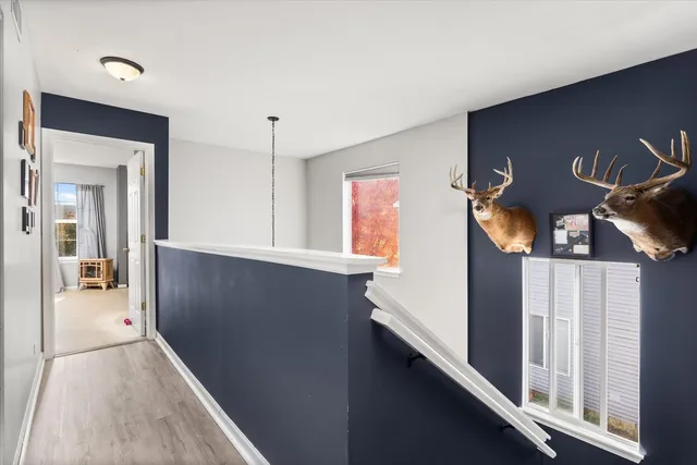 a view of a storage and utility room with washer and dryer