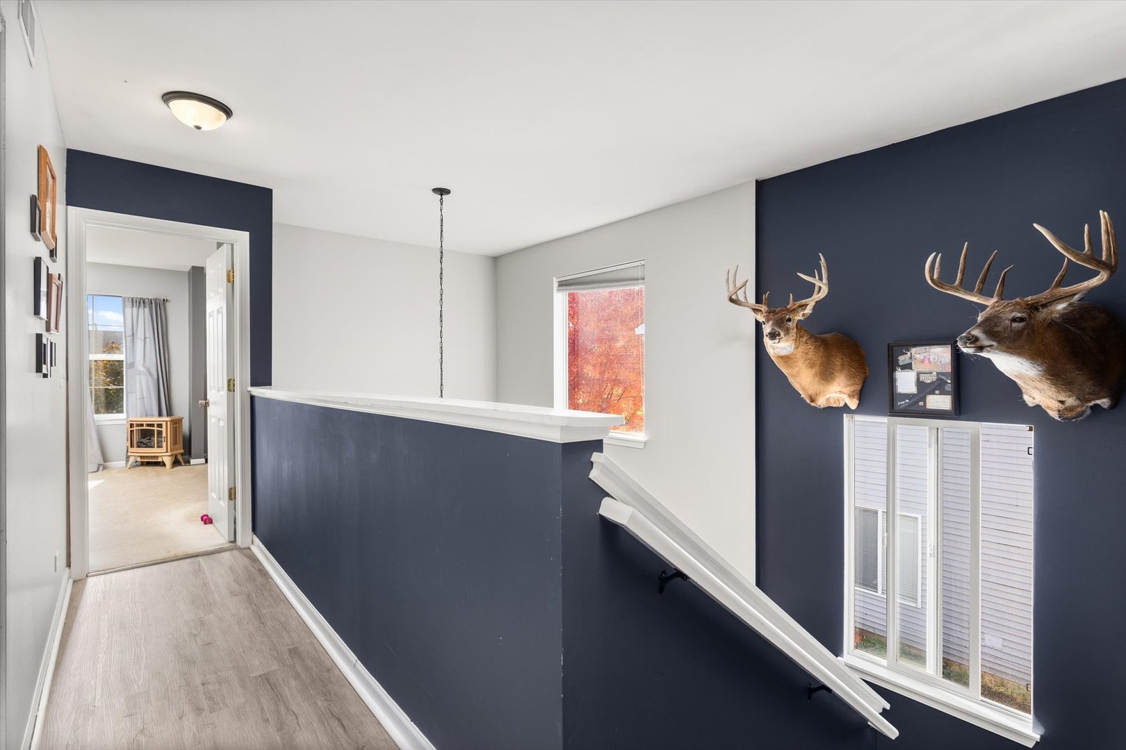2267 Margaret Drive Montgomery, IL 60538 - Photo 15 of 35 a view of staircase and living room with wooden floor