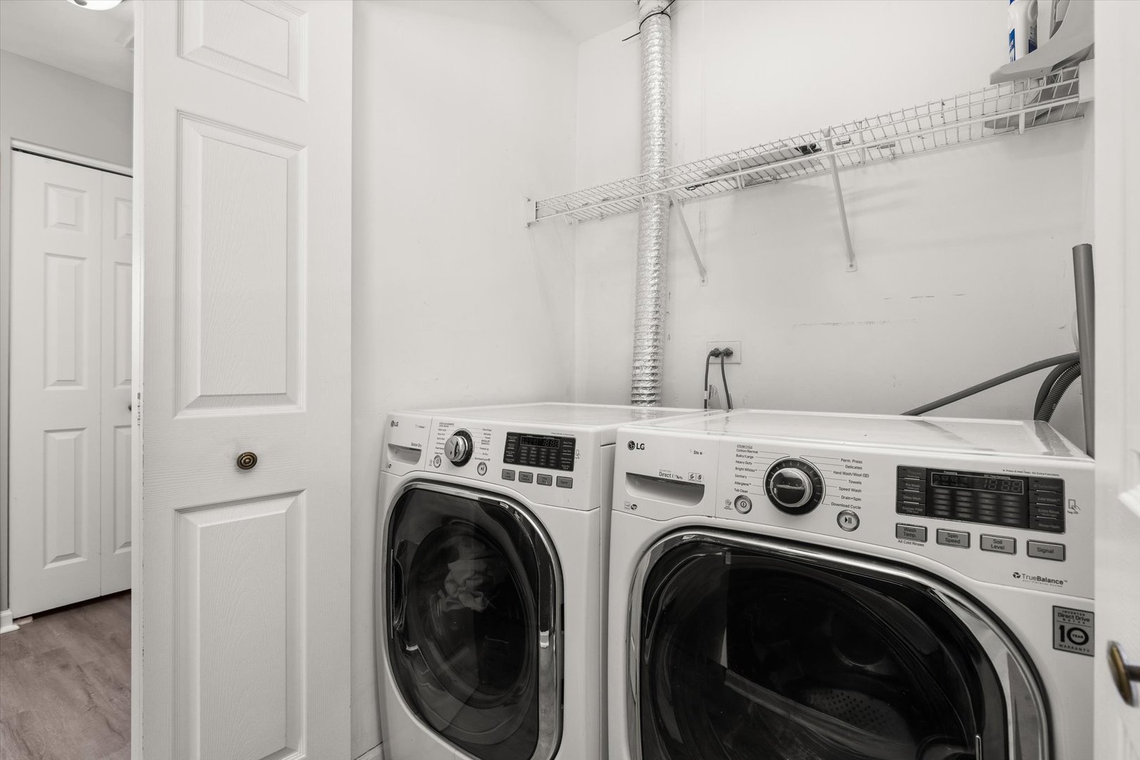 2267 Margaret Drive Montgomery, IL 60538 - Photo 16 of 35 a view of a storage and utility room with washer and dryer