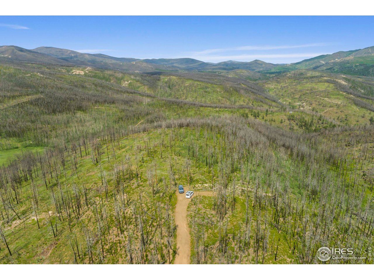 a view of an outdoor space and a mountain view