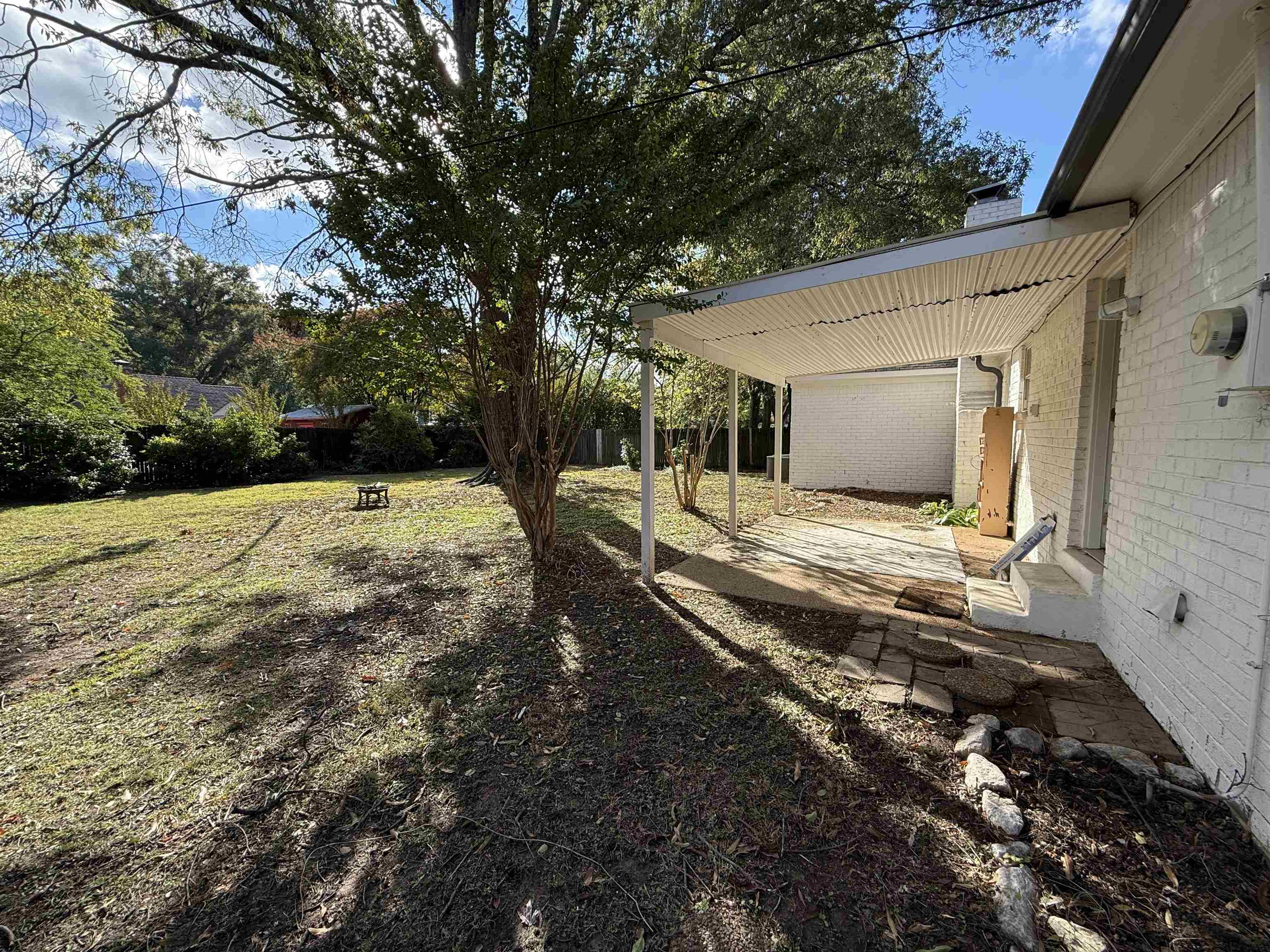 5701 Baird Drive Memphis, TN 38119 - Photo 12 of 12 View of green lawn with a patio area