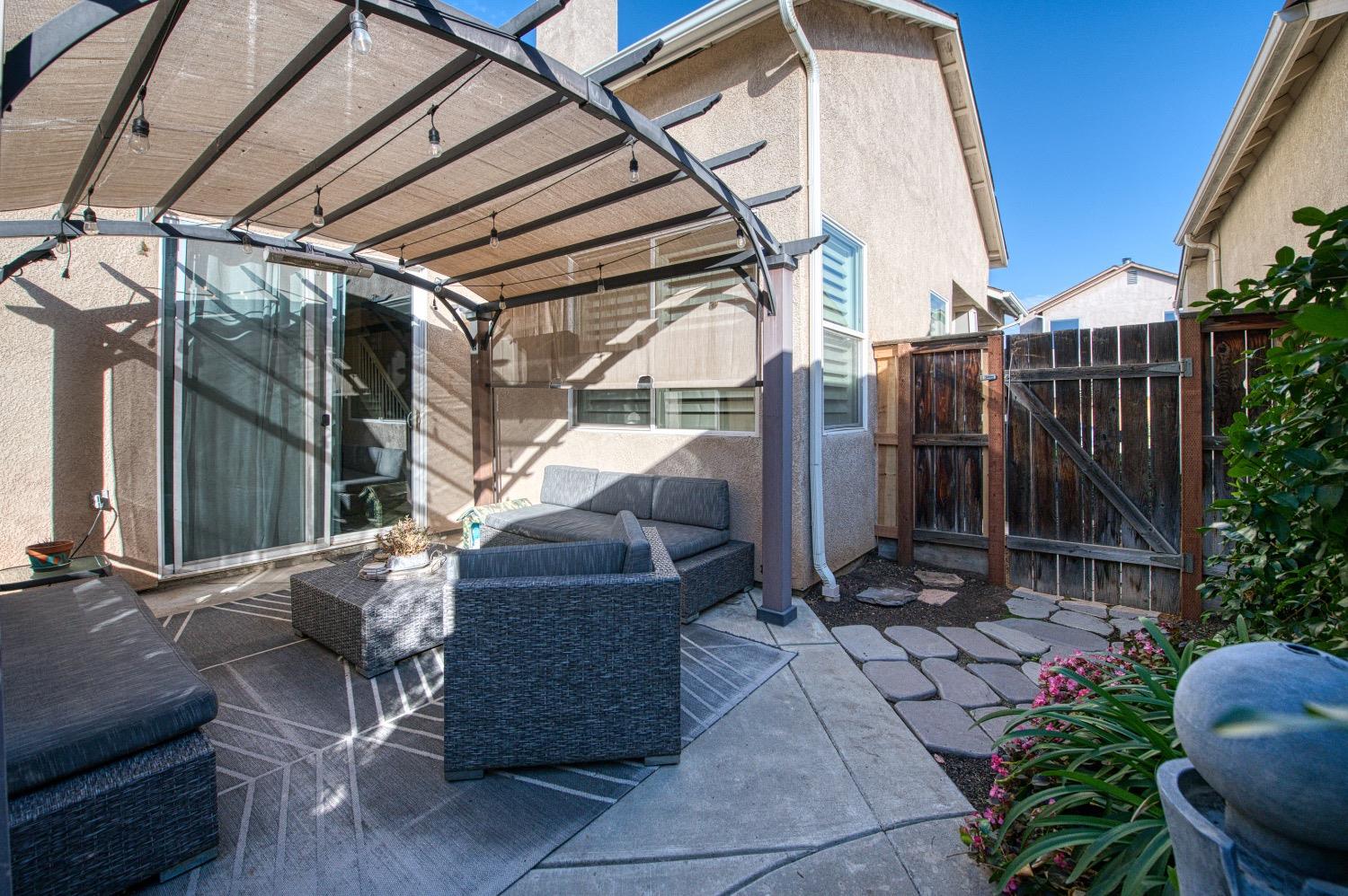 1648 North Avignon Lane Clovis, CA 93619 - Photo 25 of 27 a view of outdoor space with seating area