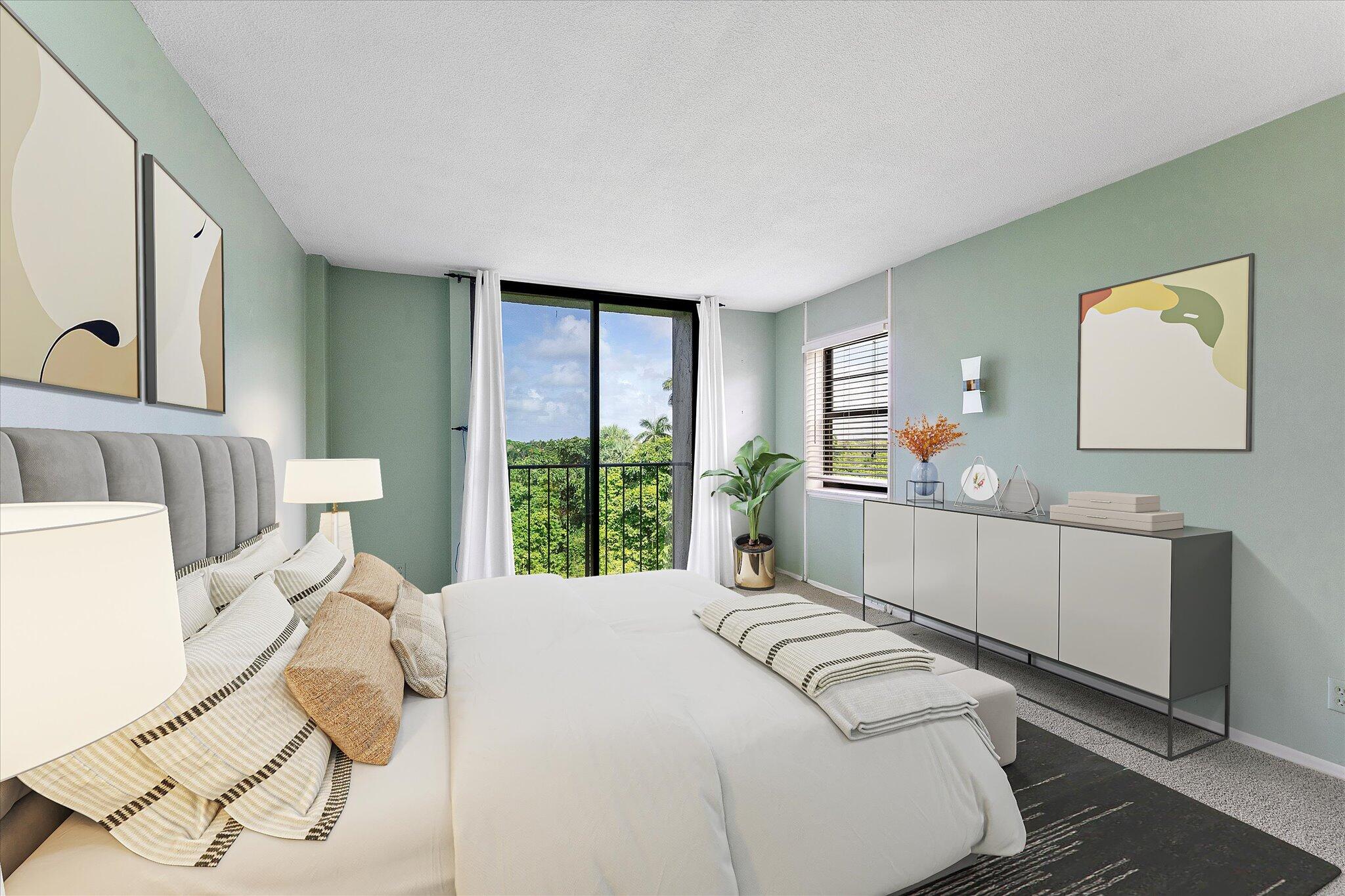 501 Southwest 11th Place, Unit 418 Boca Raton, FL 33432 - Photo 14 of 35 a bed room with a bed and a window