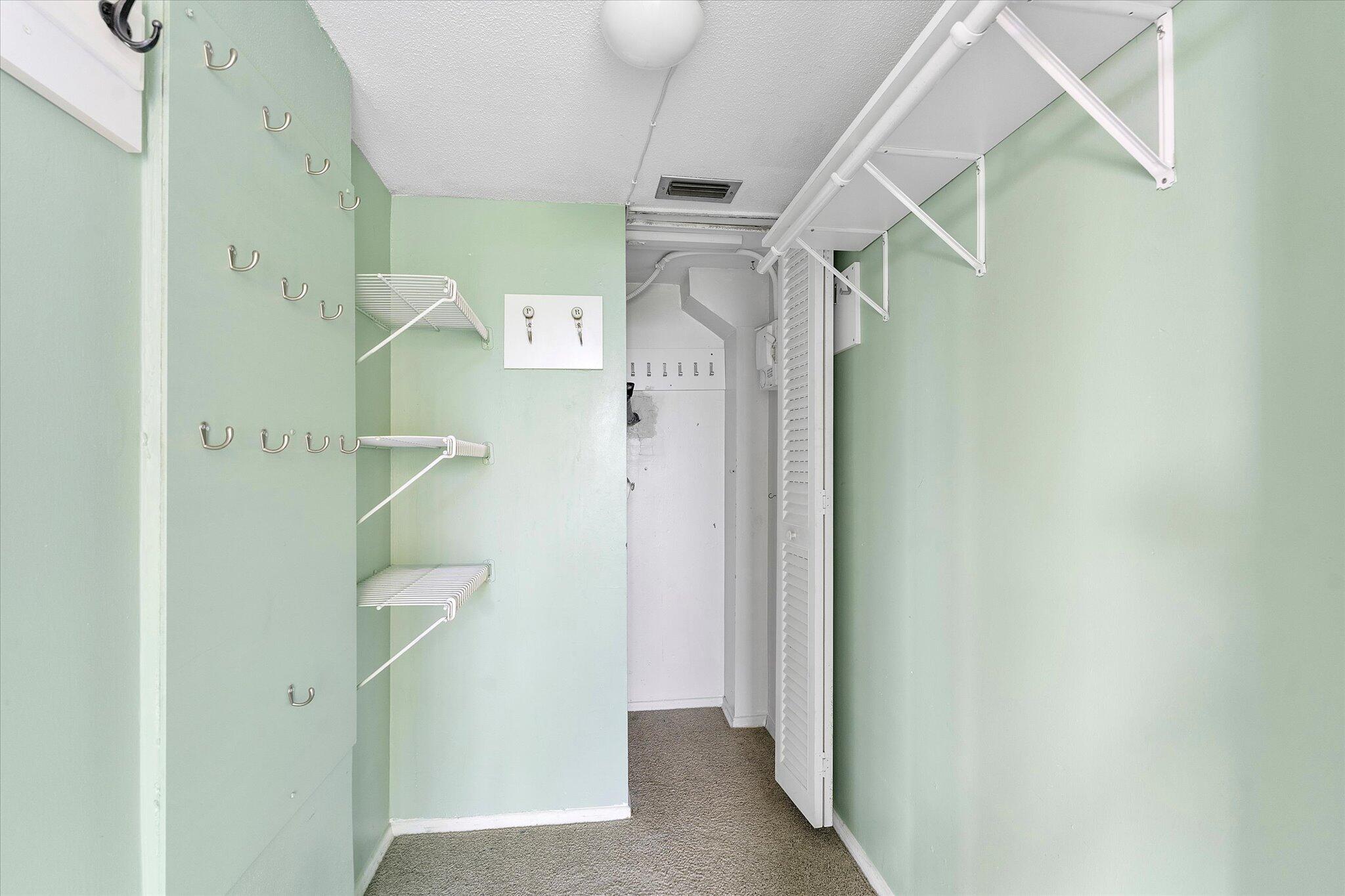 501 Southwest 11th Place, Unit 418 Boca Raton, FL 33432 - Photo 17 of 35 a view of walk in closet