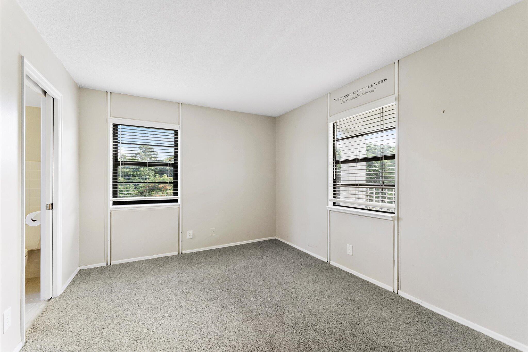 501 Southwest 11th Place, Unit 418 Boca Raton, FL 33432 - Photo 18 of 35 a view of an empty room with a window