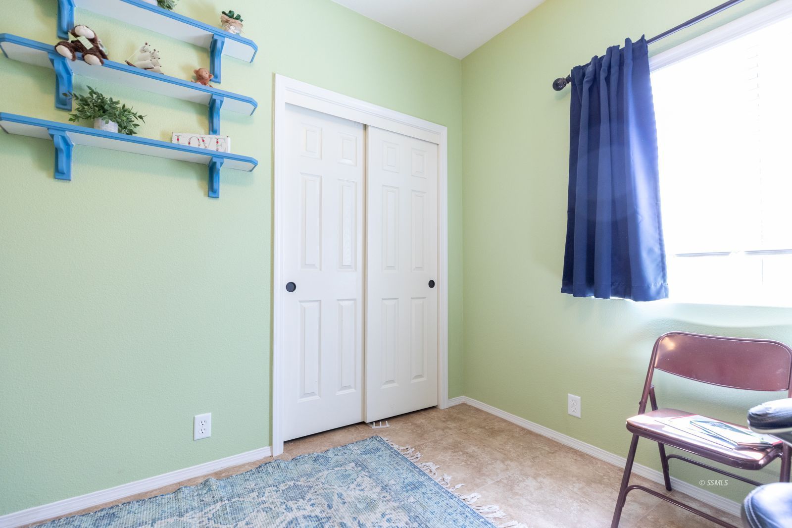 428 South Inyo Street Ridgecrest, CA 93555 - Photo 18 of 33 a view of room with window and wooden floor