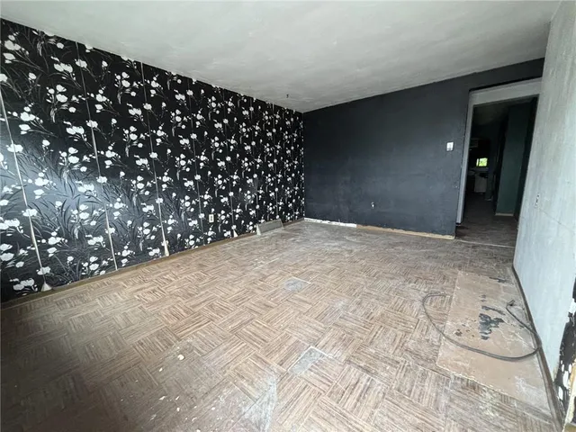 a view of an empty room and window