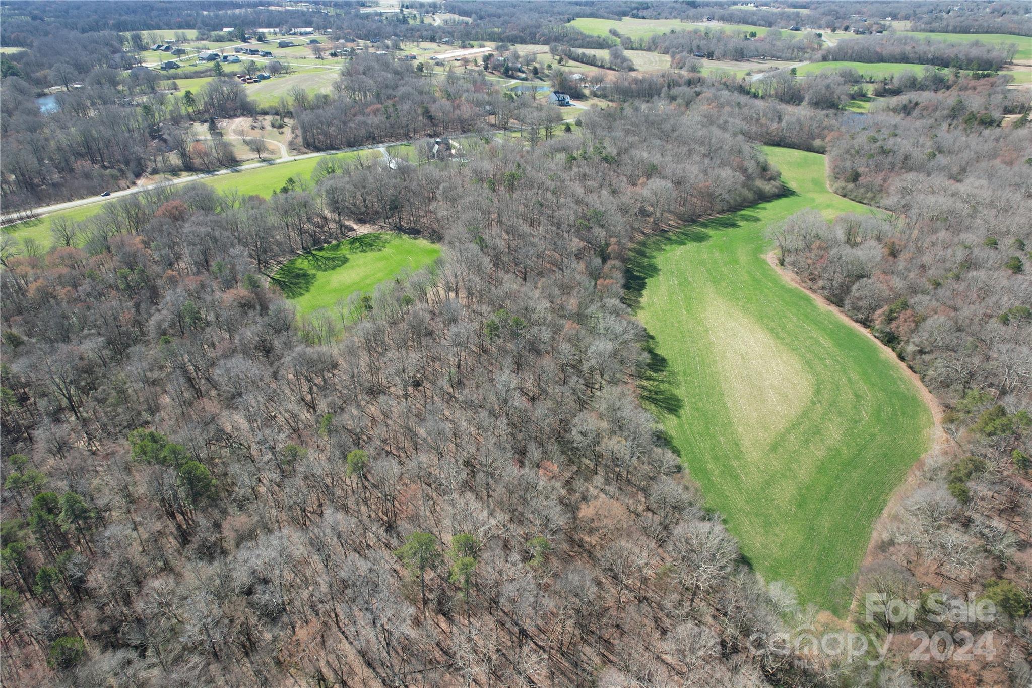 0 Old Ferry Road Monroe, NC 28110 - Photo 2 of 14 a green field with lots of green space