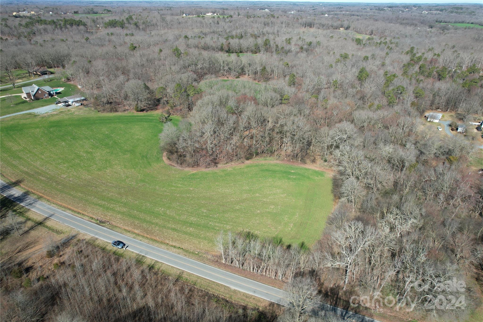 0 Old Ferry Road Monroe, NC 28110 - Photo 6 of 14 a view of a field with an outdoor space