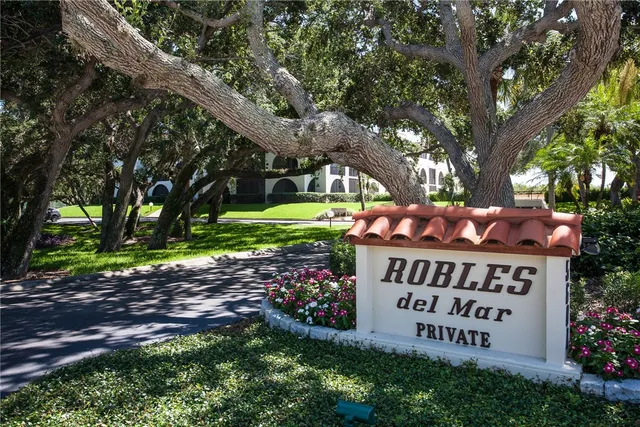 a sign on the side of the road