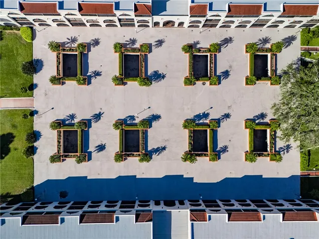 a aerial view of residential houses with outdoor space