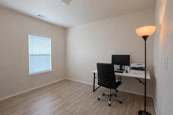 a view of a hallway with closet