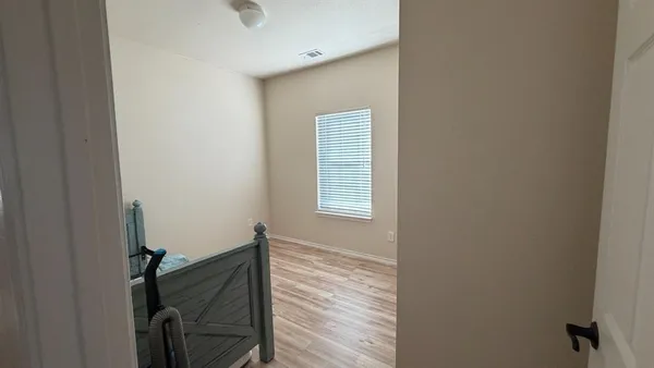 a bathroom with a shower and toilet