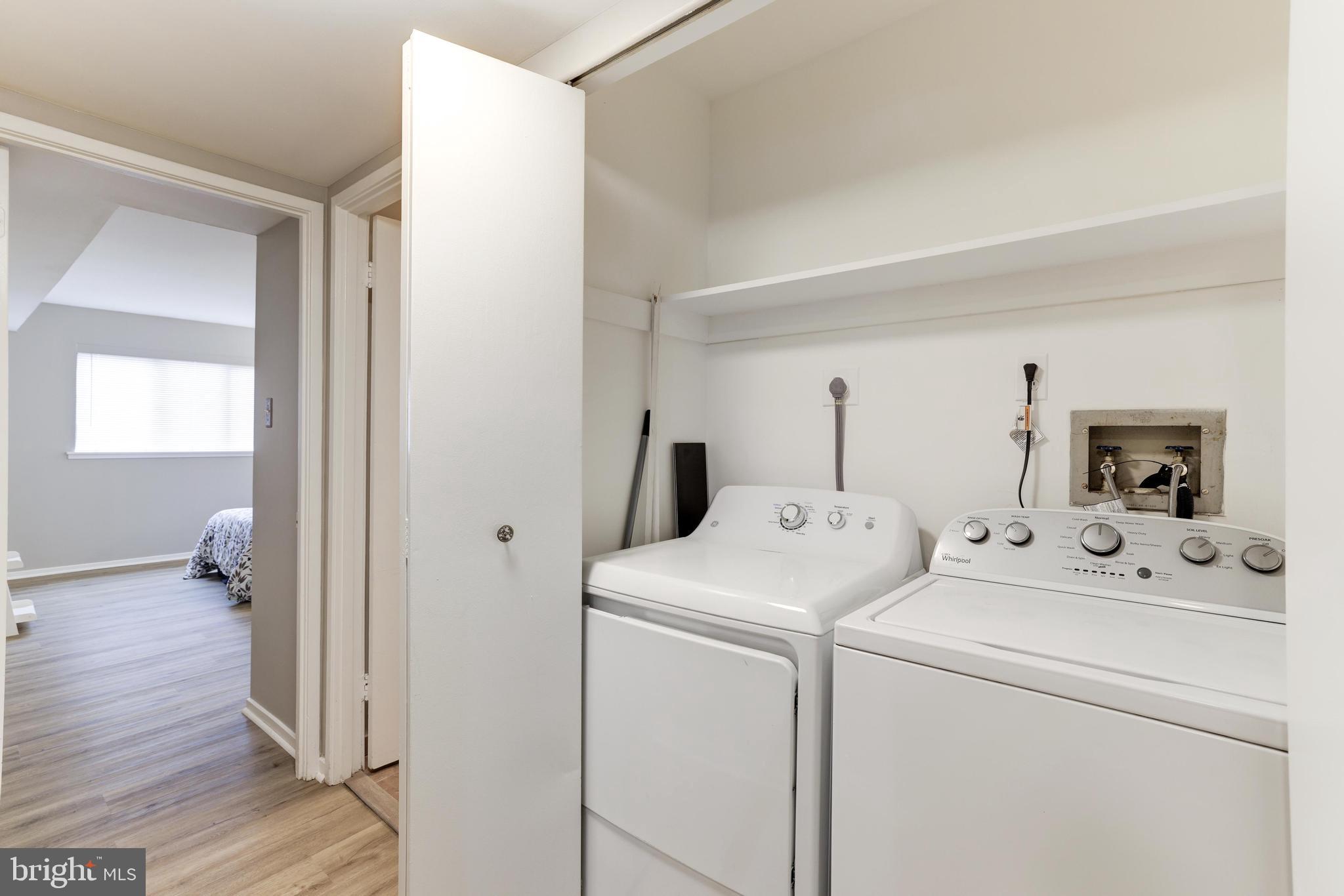 1668 Parkcrest Circle, Unit 100 Reston, VA 20190 - Photo 20 of 22 Full laundry closet with storage.
