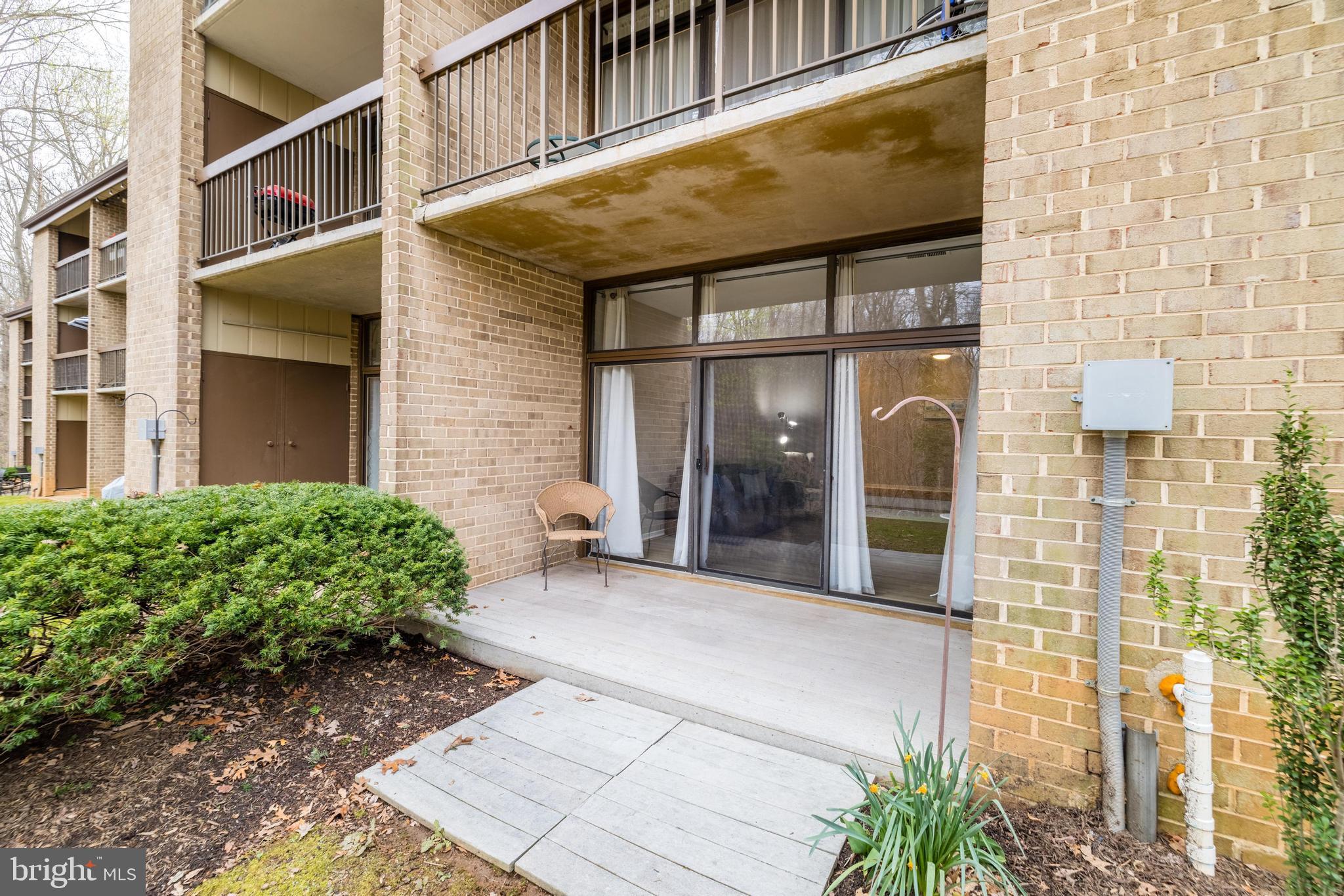 1668 Parkcrest Circle, Unit 100 Reston, VA 20190 - Photo 21 of 22 Enjoy your private patio backing to vast woods.