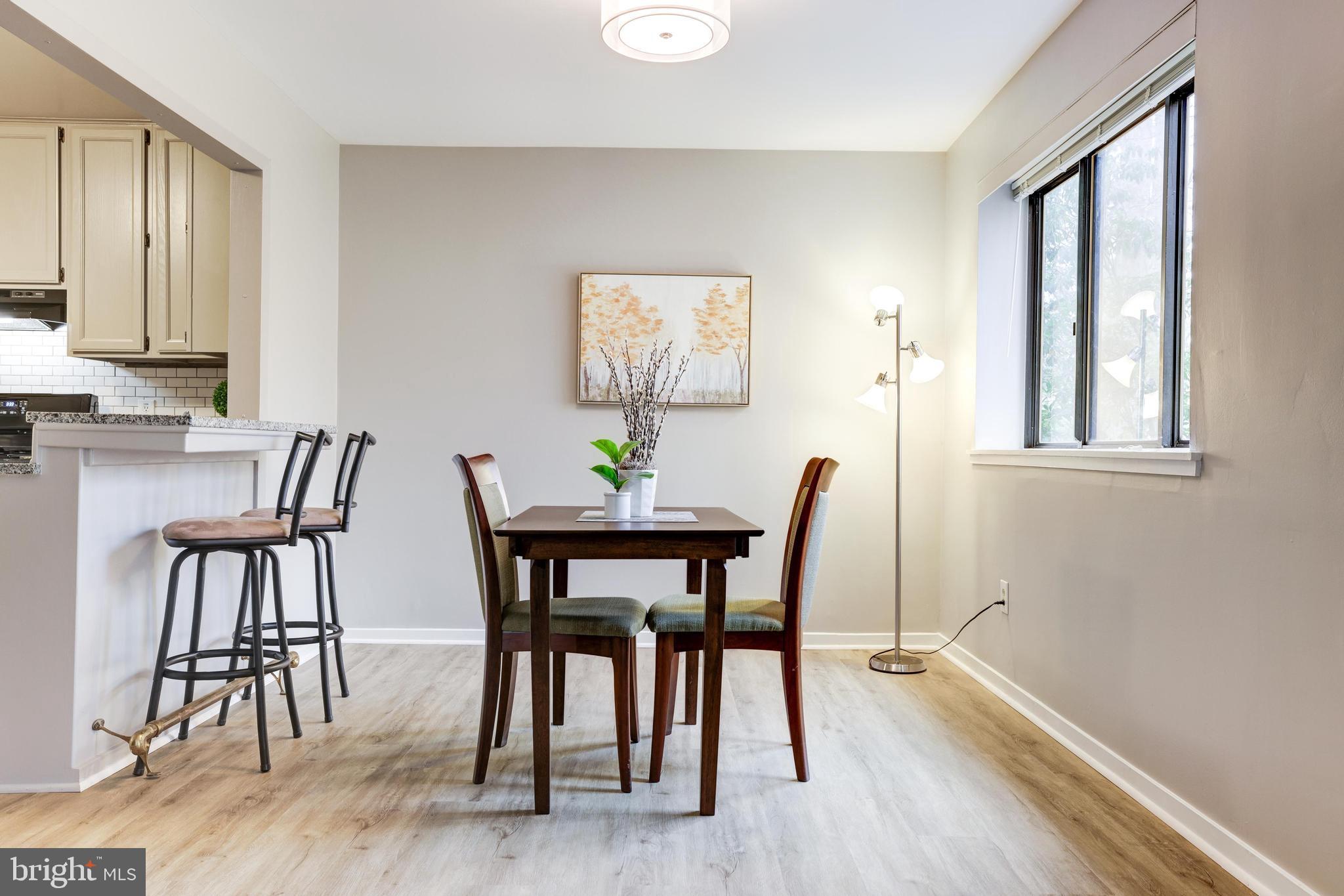 1668 Parkcrest Circle, Unit 100 Reston, VA 20190 - Photo 10 of 22 Dining area is great for entertaining.