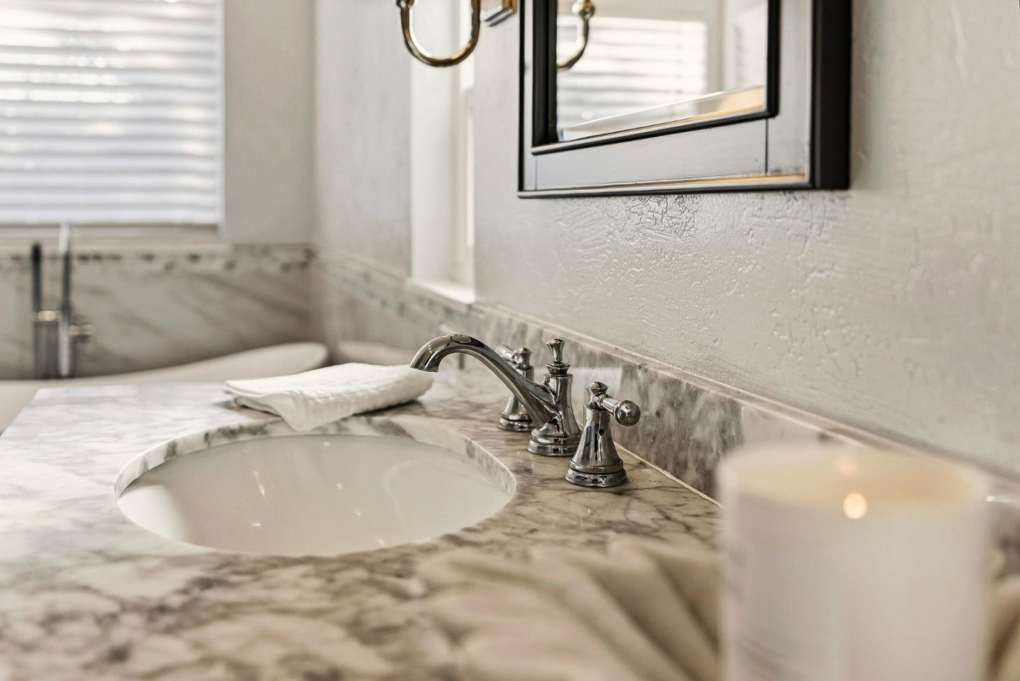 15 Del Rey Circle Salinas, CA 93901 - Photo 23 of 42 a bathroom with a sink and a mirror