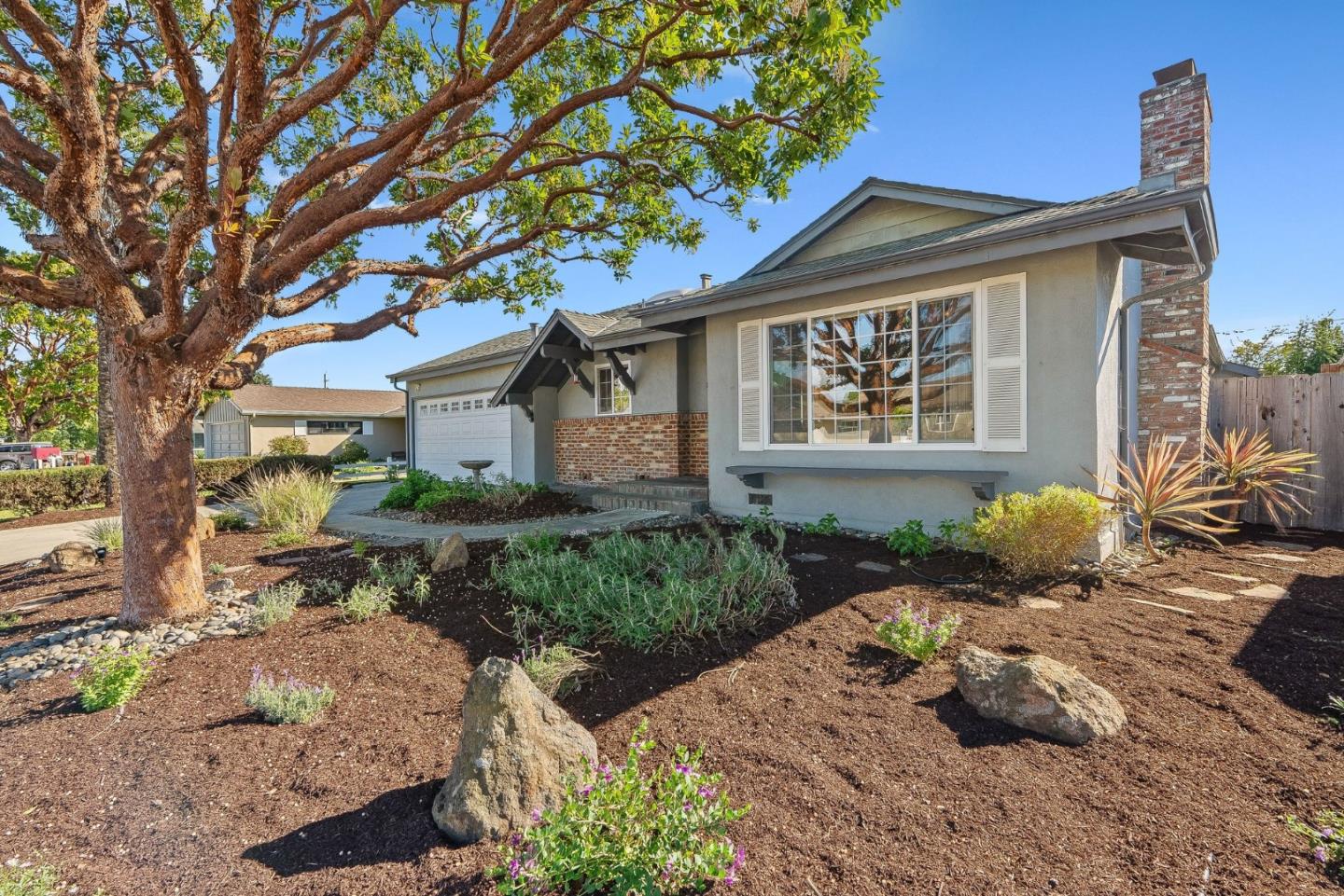 15 Del Rey Circle Salinas, CA 93901 - Photo 3 of 42 a front view of a house with a yard