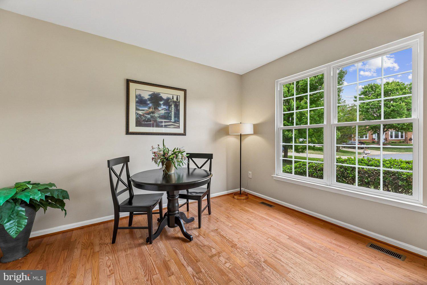 3707 Turn Back Trail Triangle, VA 22172 - Photo 6 of 55 a view of a dining room with furniture and wooden floor