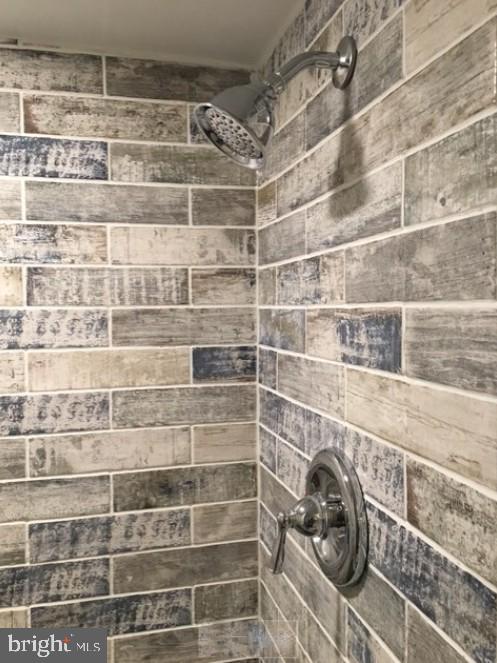15300 Beaverbrook Court, Unit 882K Silver Spring, MD 20906 - Photo 18 of 21 Custom tiles primary bathroom