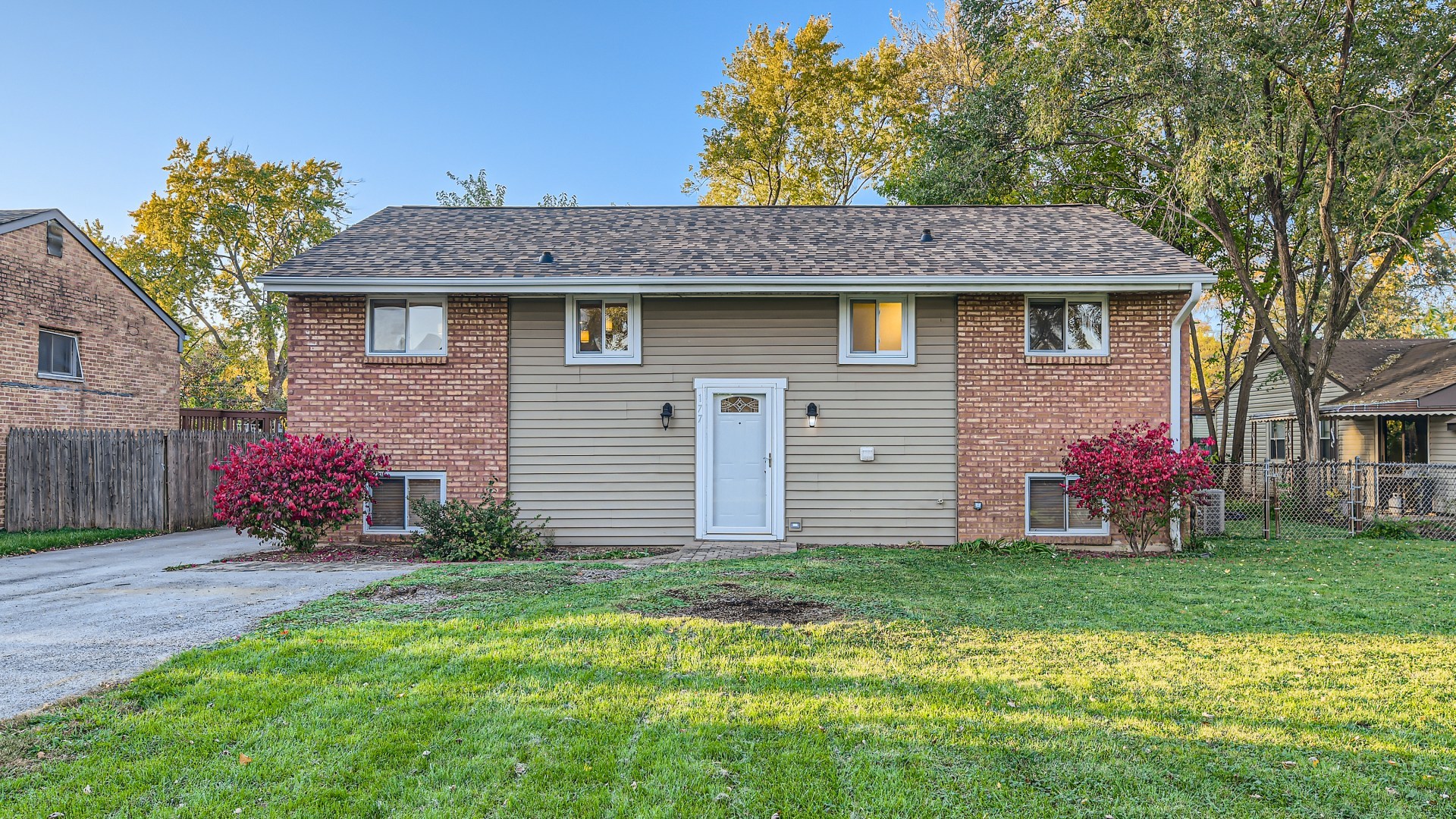 177 South Pinecrest Road Bolingbrook, IL 60440 - Photo 1 of 25 a front view of a house with garden