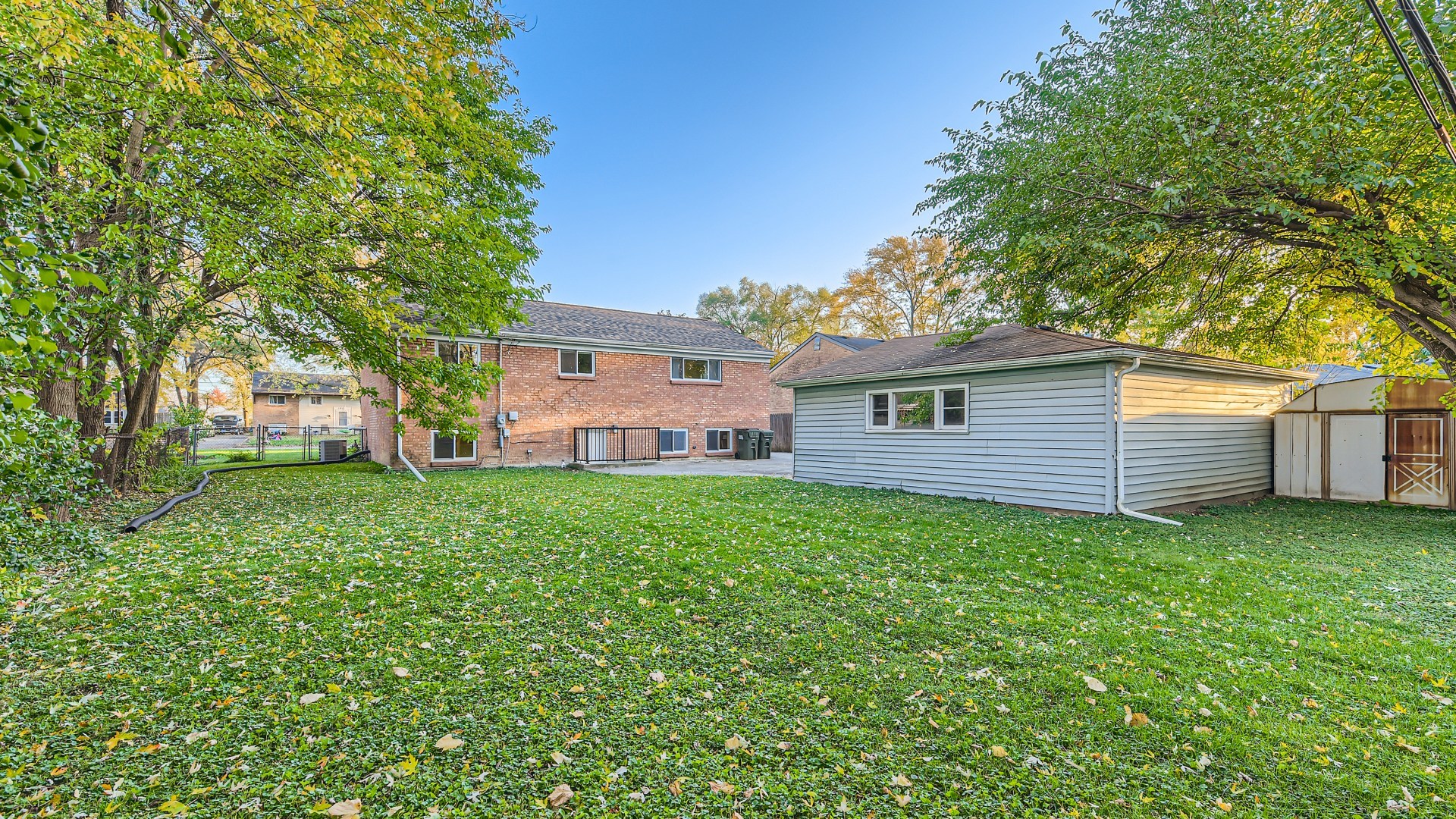 177 South Pinecrest Road Bolingbrook, IL 60440 - Photo 21 of 25 a view of a house with a back yard