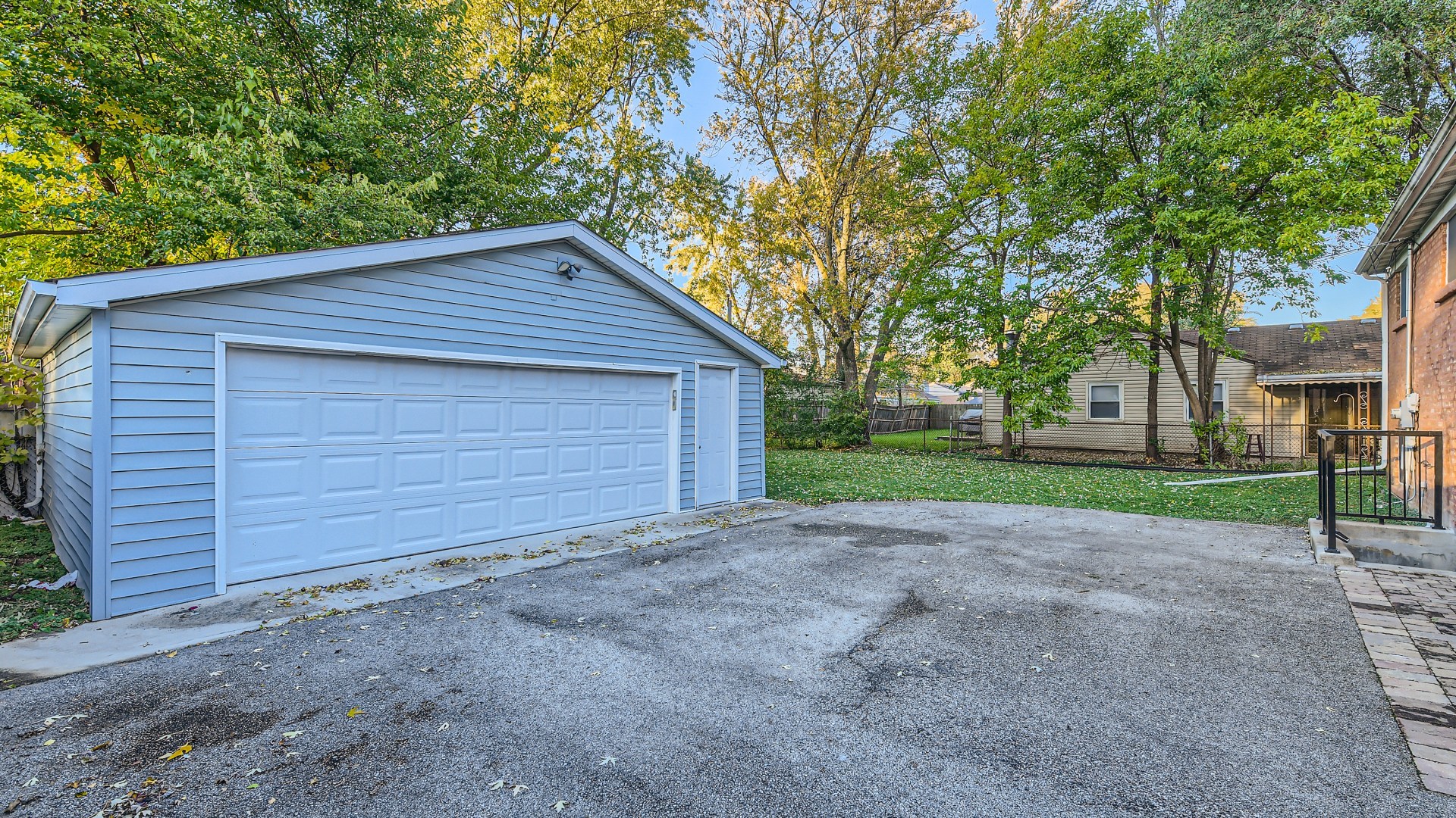 177 South Pinecrest Road Bolingbrook, IL 60440 - Photo 22 of 25 a backyard of a house with lots of green space