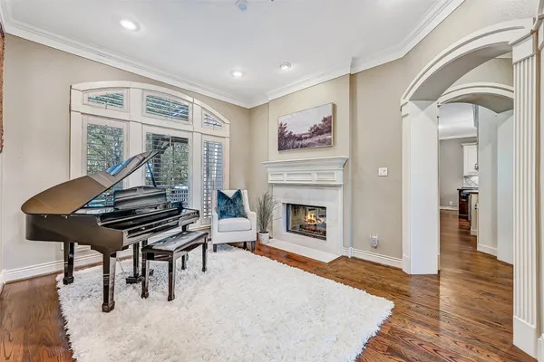 a living room with a couch and a fireplace