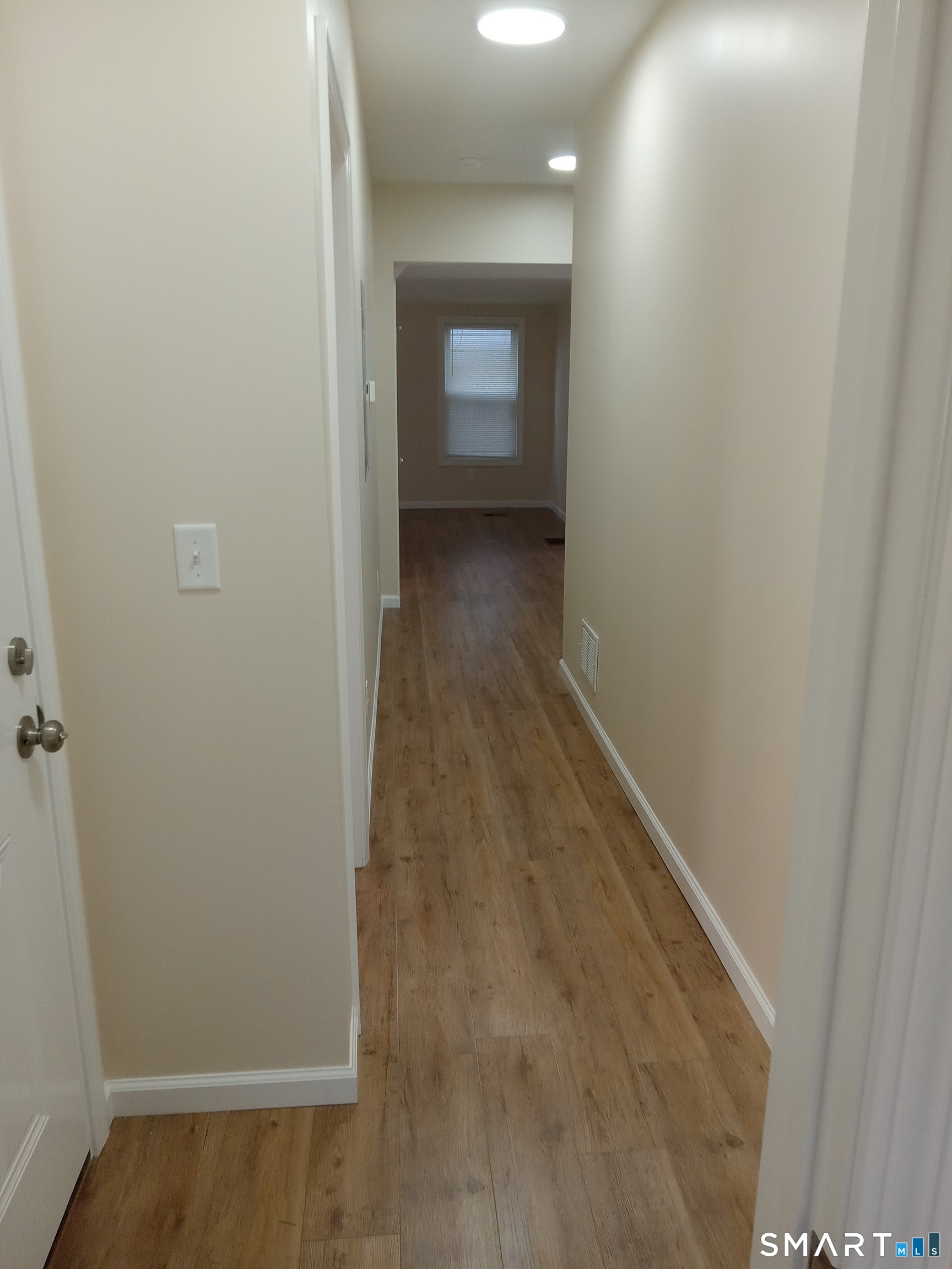 48 Prospect Street Meriden, CT 06451 - Photo 9 of 14 Hallway leading from the Primary Bedroom