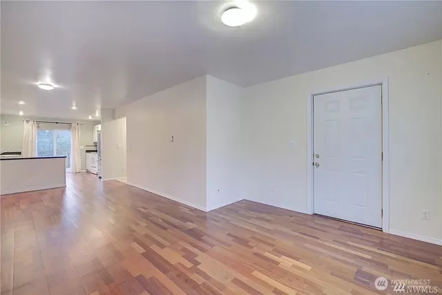 a view of a livingroom with wooden floor