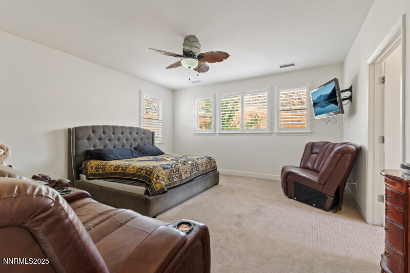 1590 Scott Valley Road Reno, NV 89523 - Photo 13 of 29 a bedroom with a bed and a couch