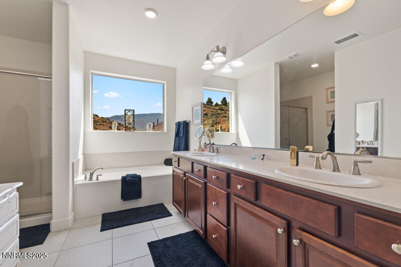 1590 Scott Valley Road Reno, NV 89523 - Photo 14 of 29 a spacious bathroom with a double vanity sink mirror and