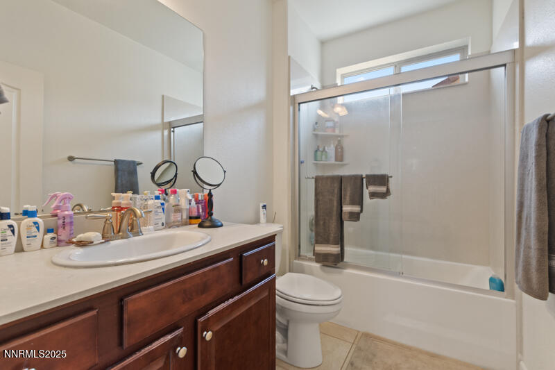 1590 Scott Valley Road Reno, NV 89523 - Photo 18 of 29 a bathroom with a sink toilet vanity and shower