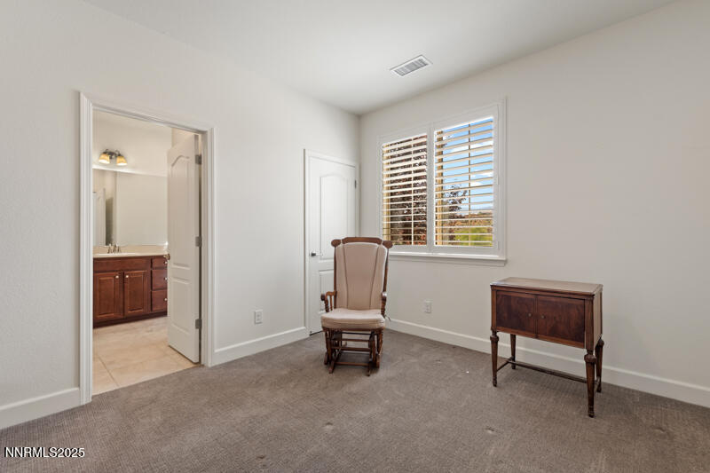 1590 Scott Valley Road Reno, NV 89523 - Photo 20 of 29 a living room with furniture and a window