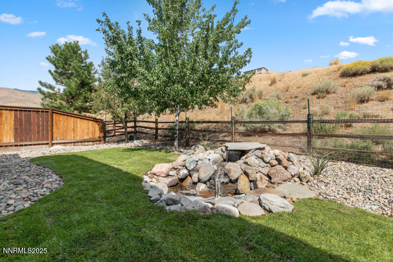1590 Scott Valley Road Reno, NV 89523 - Photo 24 of 29 a view of a backyard with of the tree