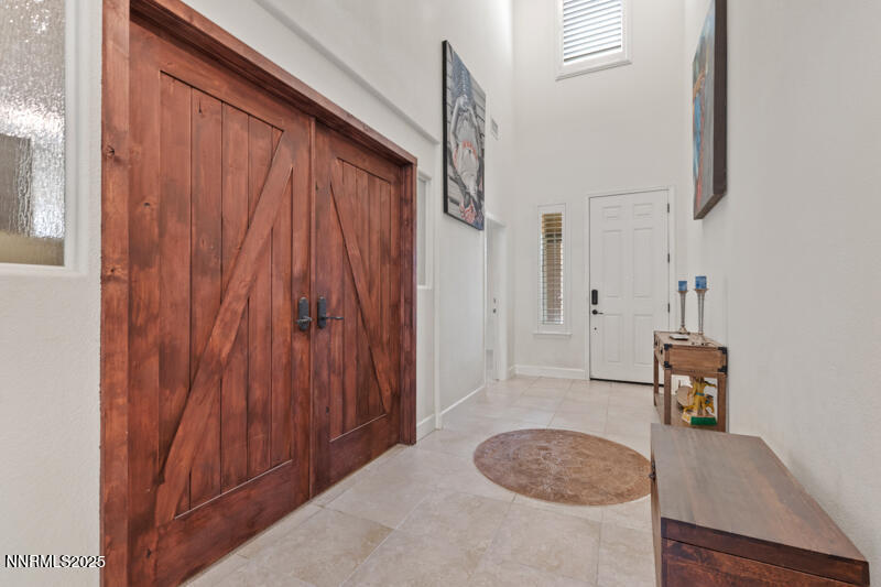1590 Scott Valley Road Reno, NV 89523 - Photo 3 of 29 a bathroom with a sink a toilet and shower